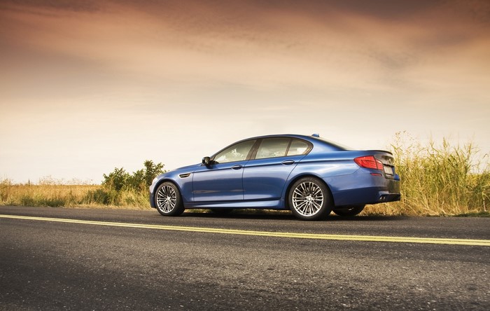 Blue BMW M5 F10 on a Road