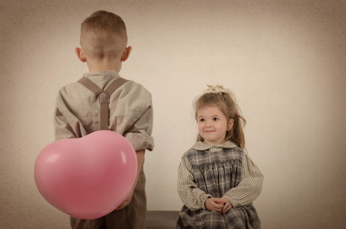 Boy with Heart Balloon and Girl