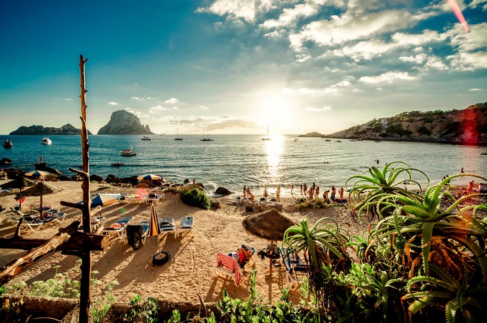 Beach in Ibiza, Spain at Sunset with Boats