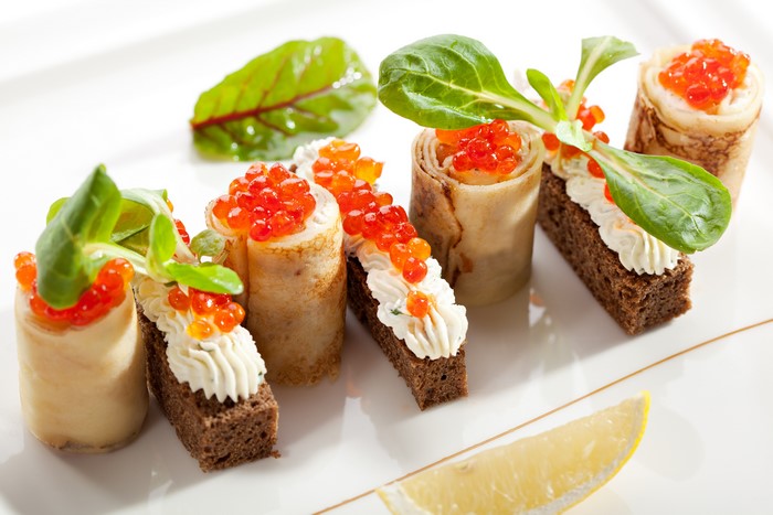 Appetizers with Caviar, Cream Cheese, and Greens