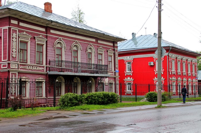 Two traditional wooden houses in Russia
