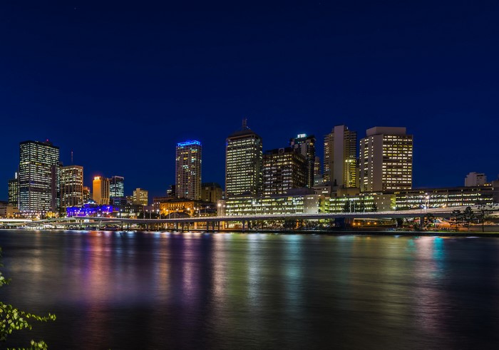 Brisbane skyline at night with river reflections