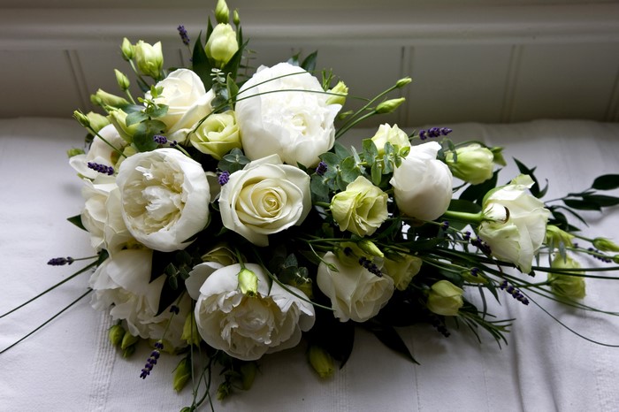 White roses and peonies bouquet with lavender