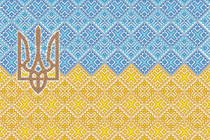 Ukrainian flag with traditional embroidery and trident