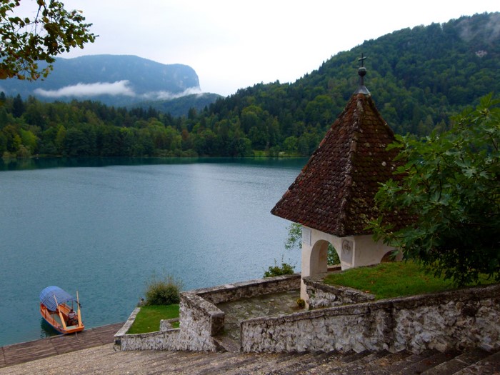 Lake Bled with a small church and boat, Slovenia
