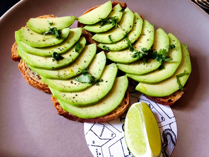Avocado toast with lime and herbs