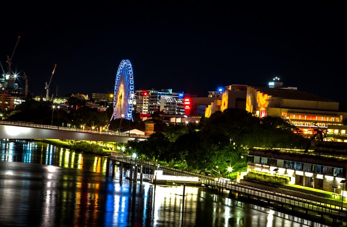 Brisbane Ferris wheel and cityscape at night