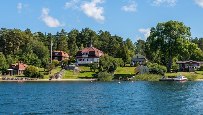 Houses on the shore of a lake in Sweden