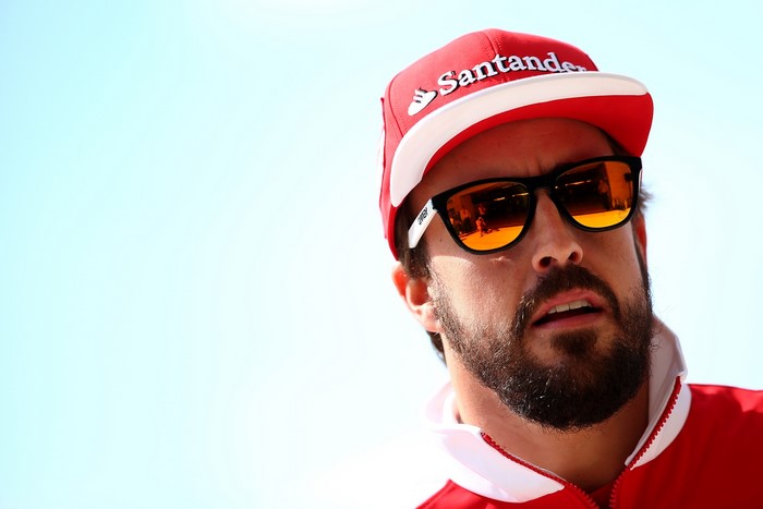Fernando Alonso wearing Santander cap and sunglasses