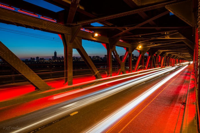 Long exposure of traffic on a bridge at night