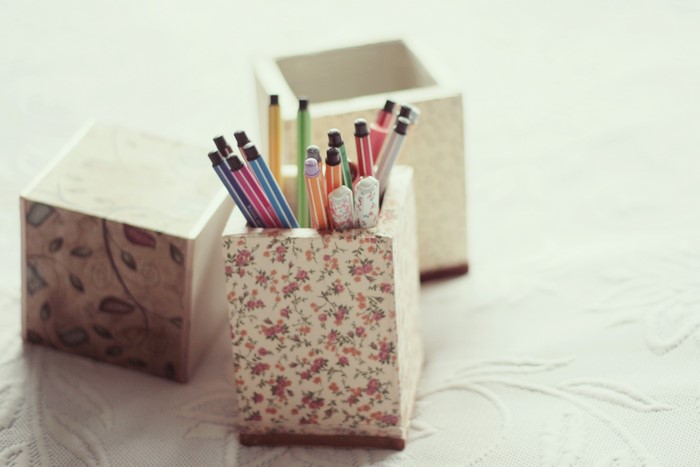 Pencil holders with pens and markers