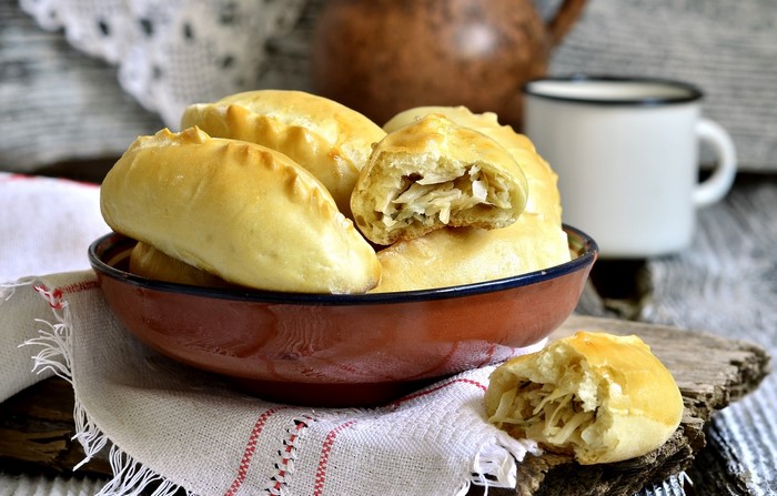 Baked Buns with Cabbage Filling in a Bowl