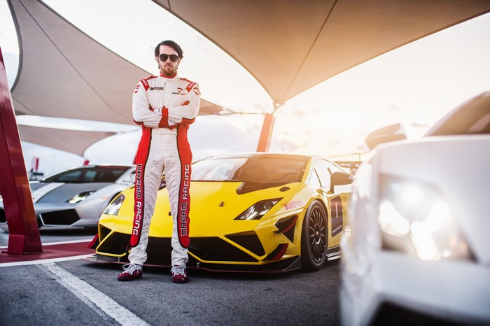 Man in Racing Suit with Lamborghini Gallardo Super Trofeo