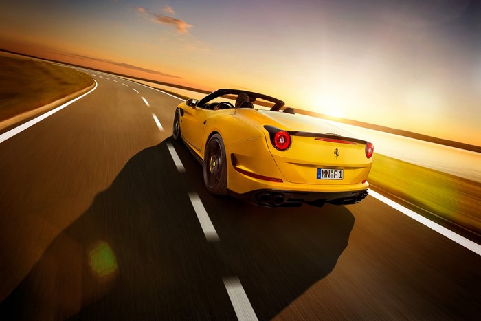 Yellow Ferrari California T Cabriolet on a Road