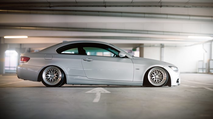 Silver BMW E92 M3 parked in a garage