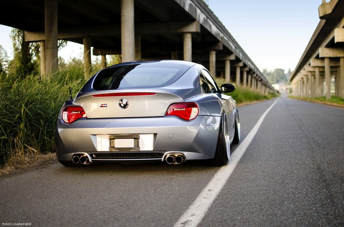 Silver BMW Z4 Coupe on a Road Under an Overpass