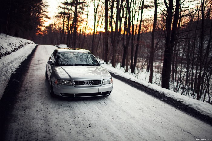 Silver Audi A4 Sedan on a Snowy Road