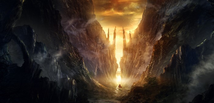A lone figure walks through a mountain pass at sunset