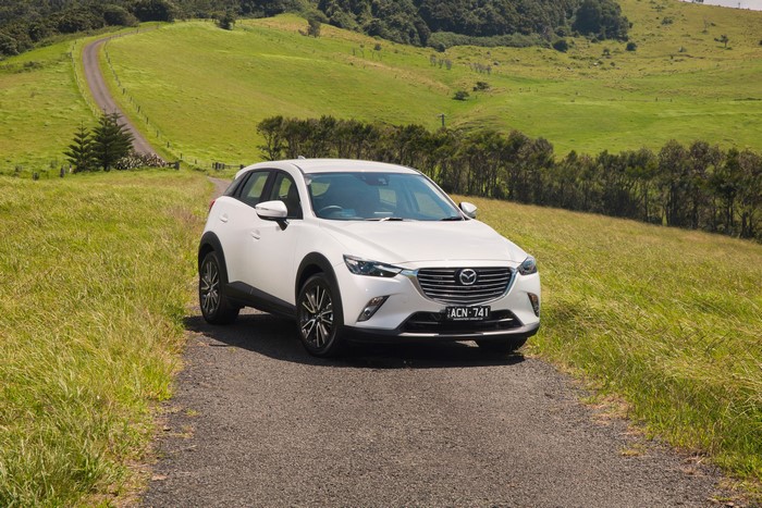White Mazda CX-3 on a rural road