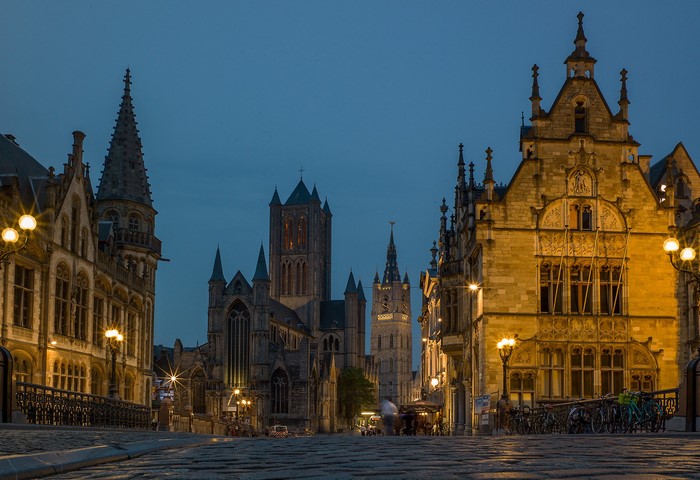 Ghent, Belgium street at night with historic buildings