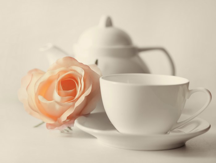 White Teapot, Cup, Saucer, and Peach Rose