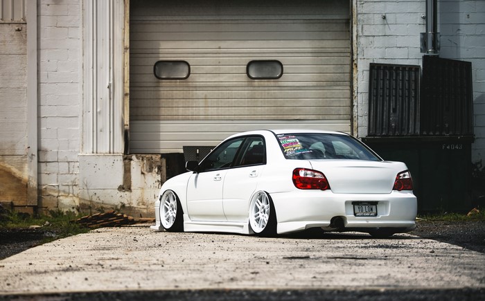 White Subaru Impreza WRX STI from behind