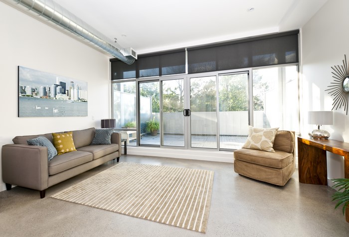 Modern Living Room with Sofa and Large Windows