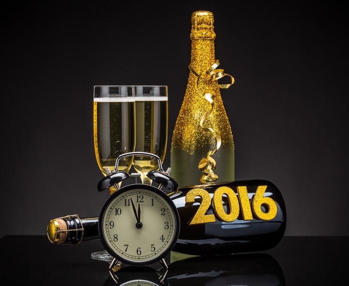 New Year's Eve celebration with champagne and clock