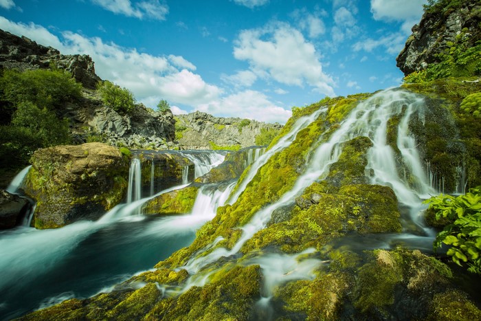 Waterfalls covered in moss in Iceland