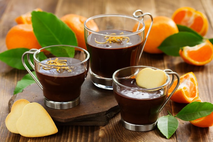 Chocolate dessert with oranges and cookies