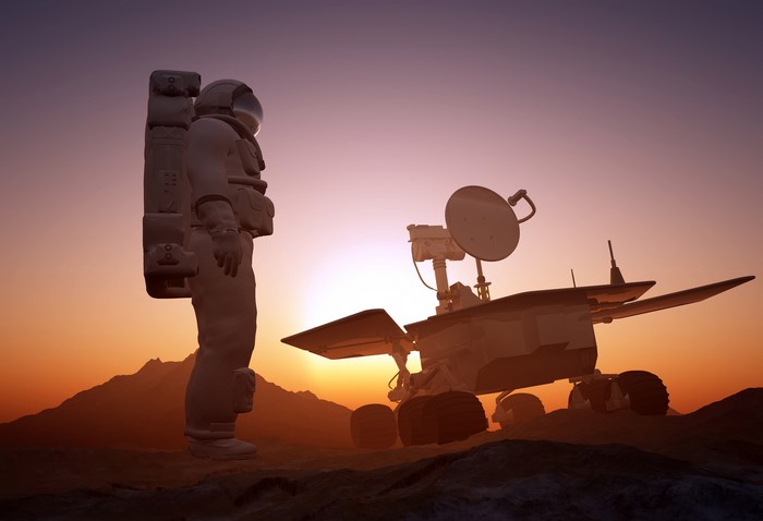 Astronaut and Mars Rover on Mars
