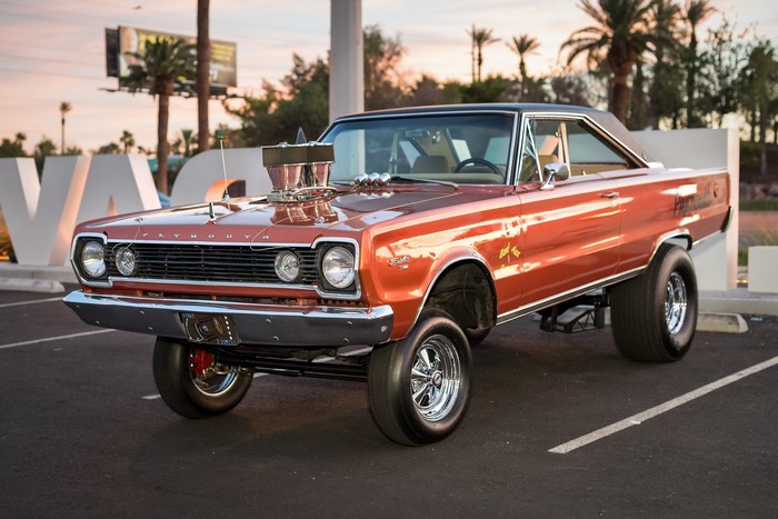 Orange Plymouth drag car with large engine