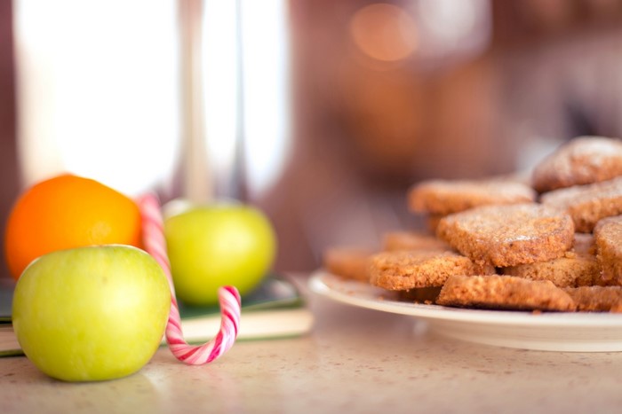 Apples, Candy Cane, and Cookies on a Plate