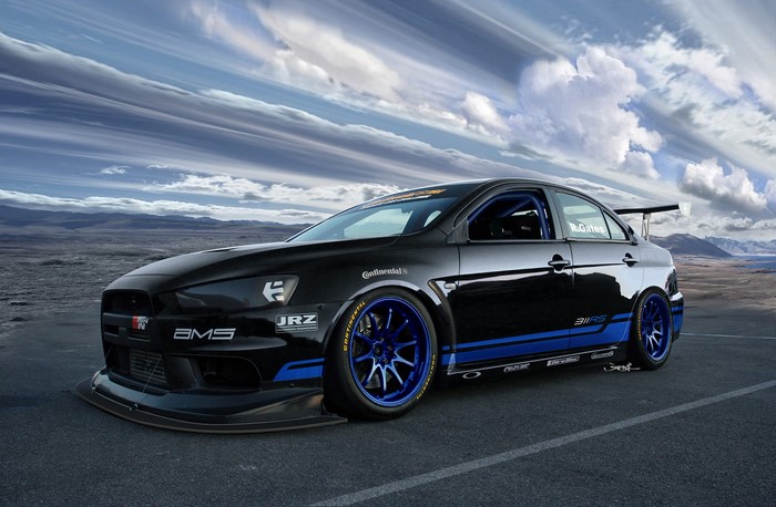 Black Mitsubishi Lancer Evolution X with Blue Accents
