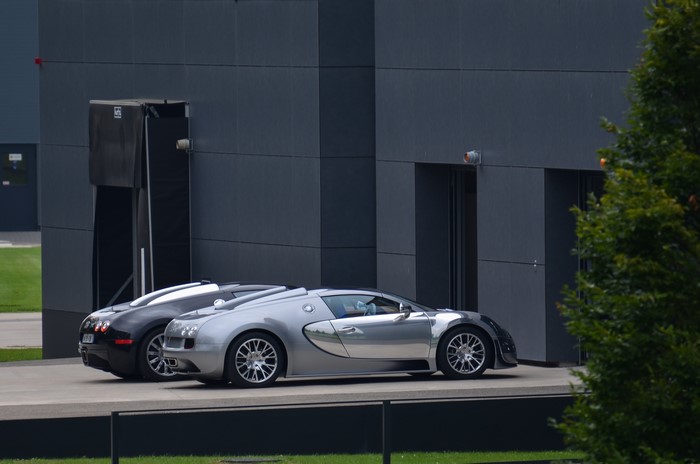 Bugatti Veyron Grand Sport Vitesse cars parked outside building