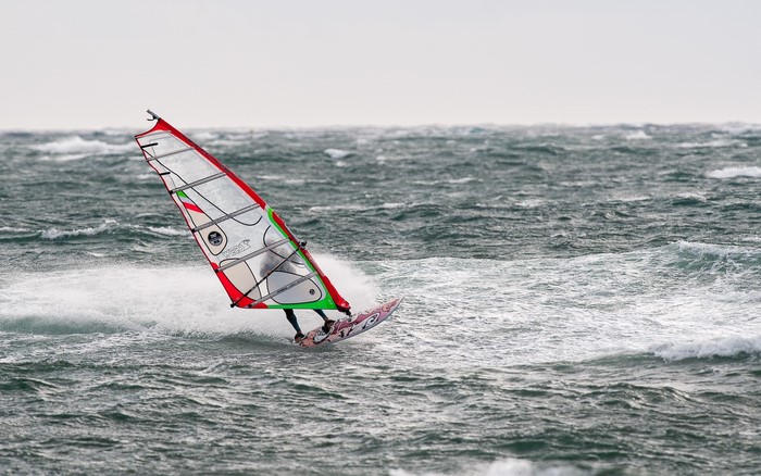 Windsurfer on choppy sea