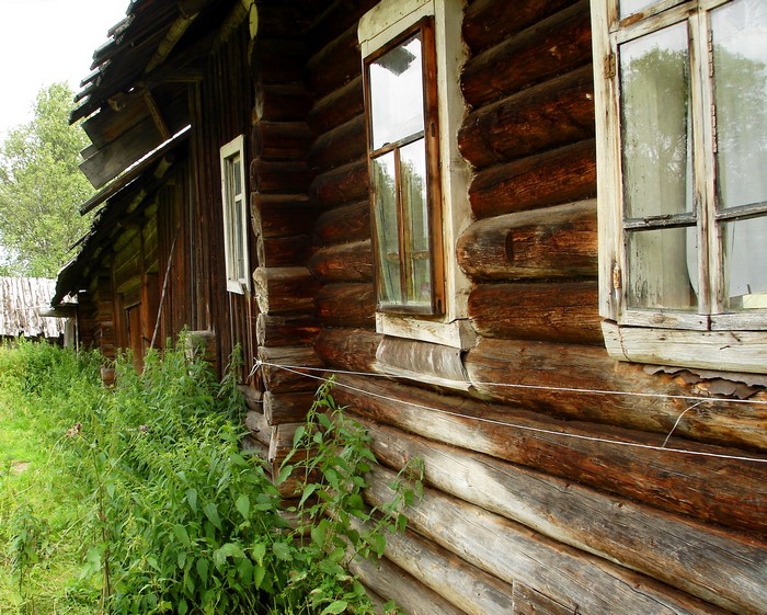 Old wooden house with windows
