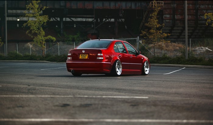 Red Volkswagen Jetta MK4 in Parking Lot