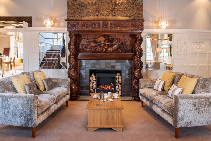 Living room with fireplace and sofas