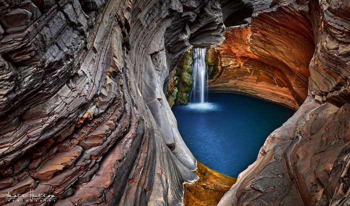 Waterfall in a rocky gorge, Karijini National Park, Western Australia