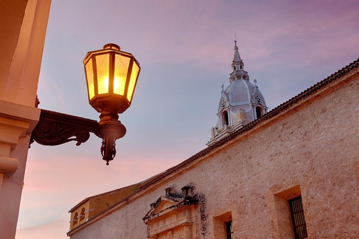 Street light in front of a cathedral in Colombia