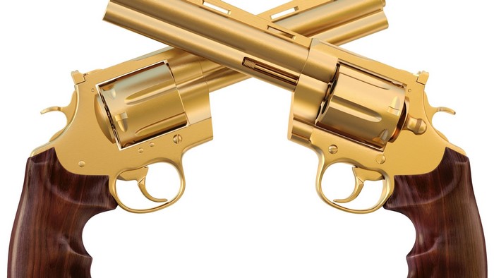 Two gold revolvers crossed