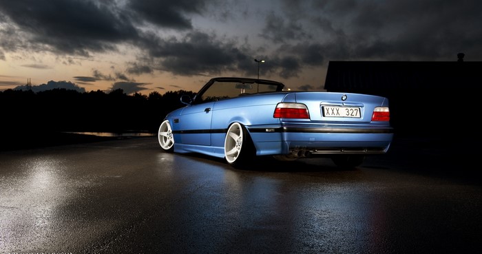 Blue BMW E36 Convertible with Custom Wheels