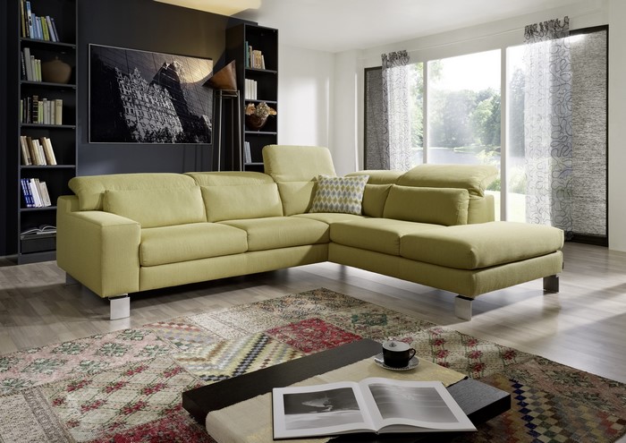 Modern living room with sectional sofa and bookshelves