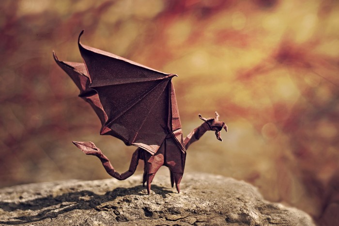 Origami Dragon Toy on a Rock