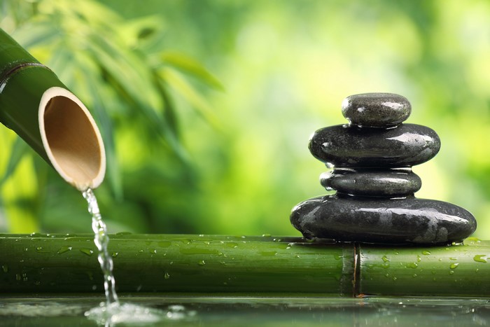 4K Serene Bamboo Water and Balanced Stones