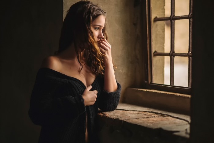 Woman by a window