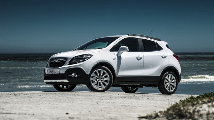 White Opel Mokka on a Beach