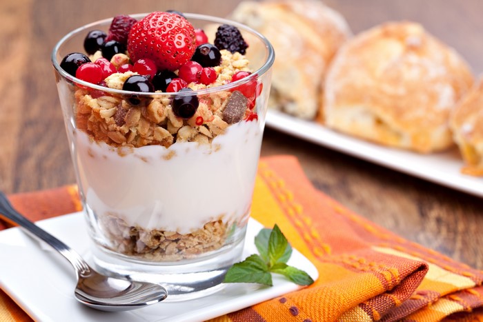 Yogurt parfait with berries and granola in a glass
