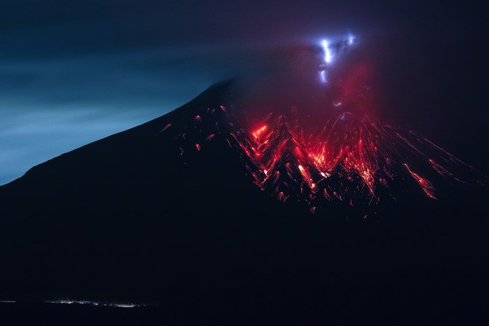 Sakurajima volcano erupting with lava and lightning